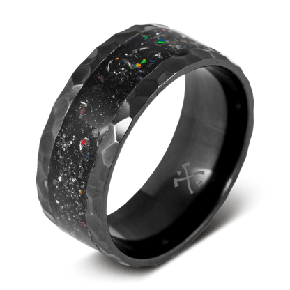 The galactic raptor black ring for men made with black zirconium, dinosaur bone, meteorite, and space titanium opal